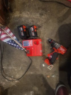 Milwaukee m18 drill 2 batteries and charger