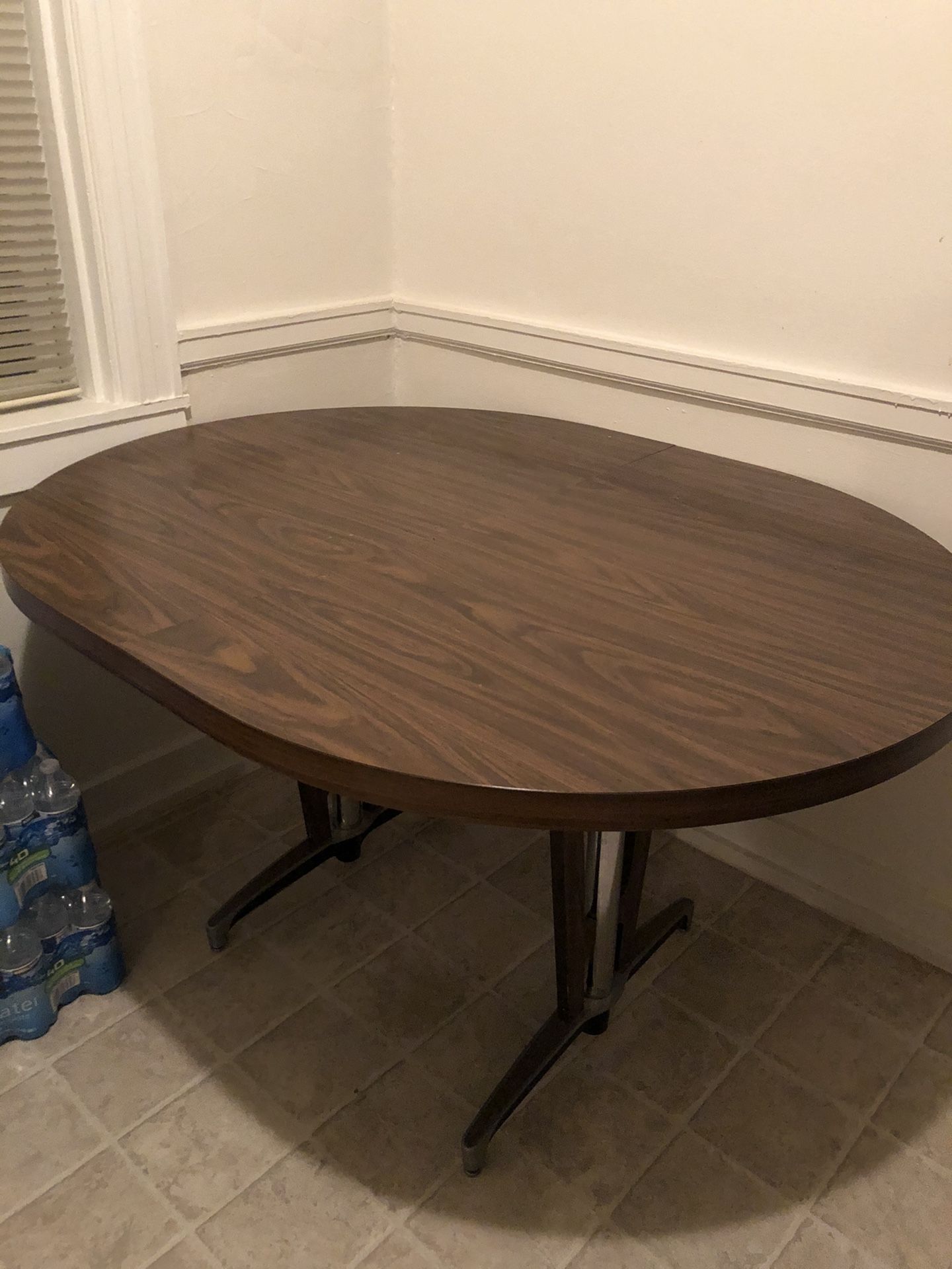 Brown round dining table (size for 6 chairs)