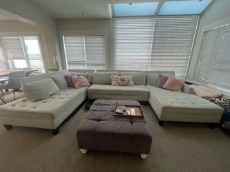 Free sectional couch and ottoman.