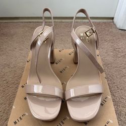 Mix No. 6 beige pumps in a size women’s 8