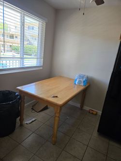 Wood table with four chirs