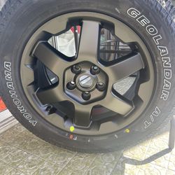 Yokohama Geolandar A/T Tire on Black Rim 