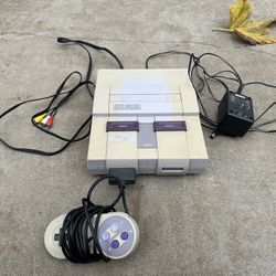 Super Nintendo and one Controller