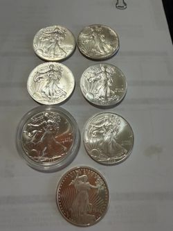 (7) SILVER EAGLES .999 REAL