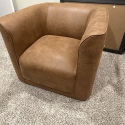 Brown Faux leather swivel chair