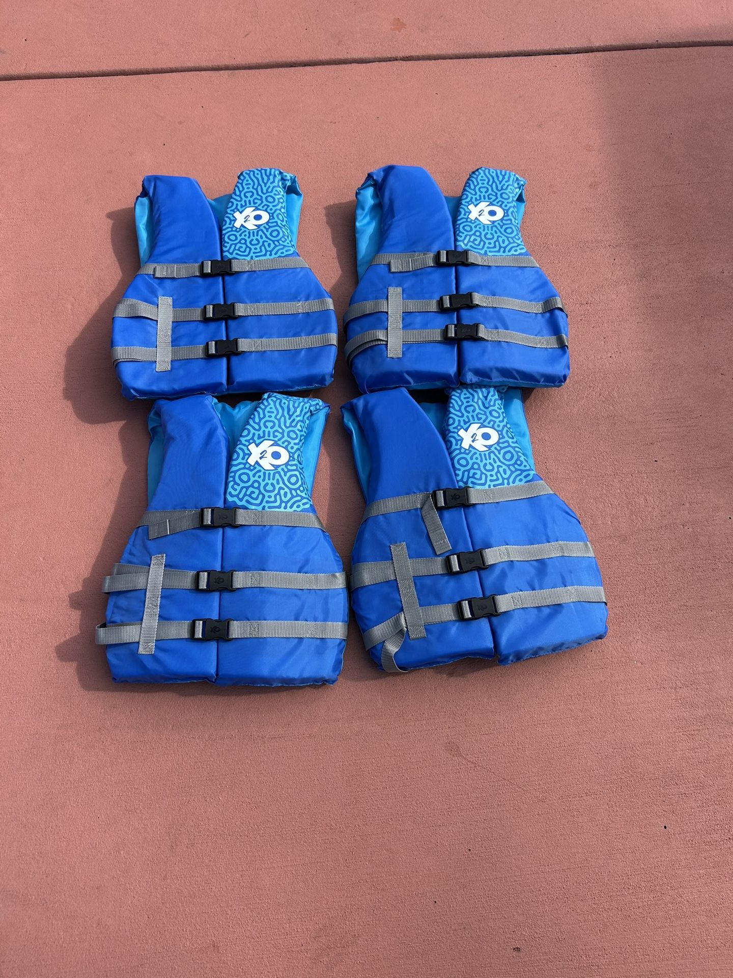4 Life Jackets Boating Water Sports