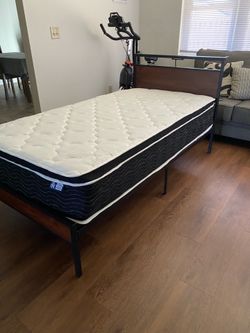 Twin bed frame with mattress