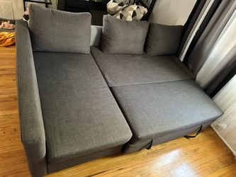 Sleeper three seat sectional sofa with storage