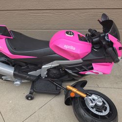 Aprilia pink kids motorcycle needs to be put together  240 handyman