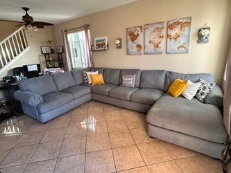 Large and comfortable Grey Sectional Couch from Jerome’s