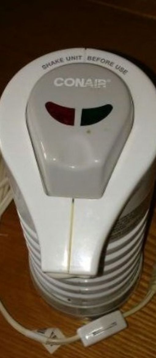 CONAIR INSTANT HOT LATHER SHAVING CREAM MACHINE.