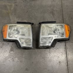 2009-2014 FORD F150 DRIVERS AND PASSENGER HEADLIGHTS OEM