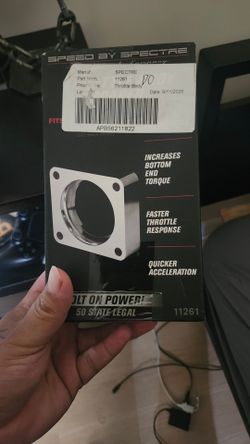 Throttle body spacer