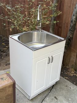 Brand new outdoor sink and cabinet