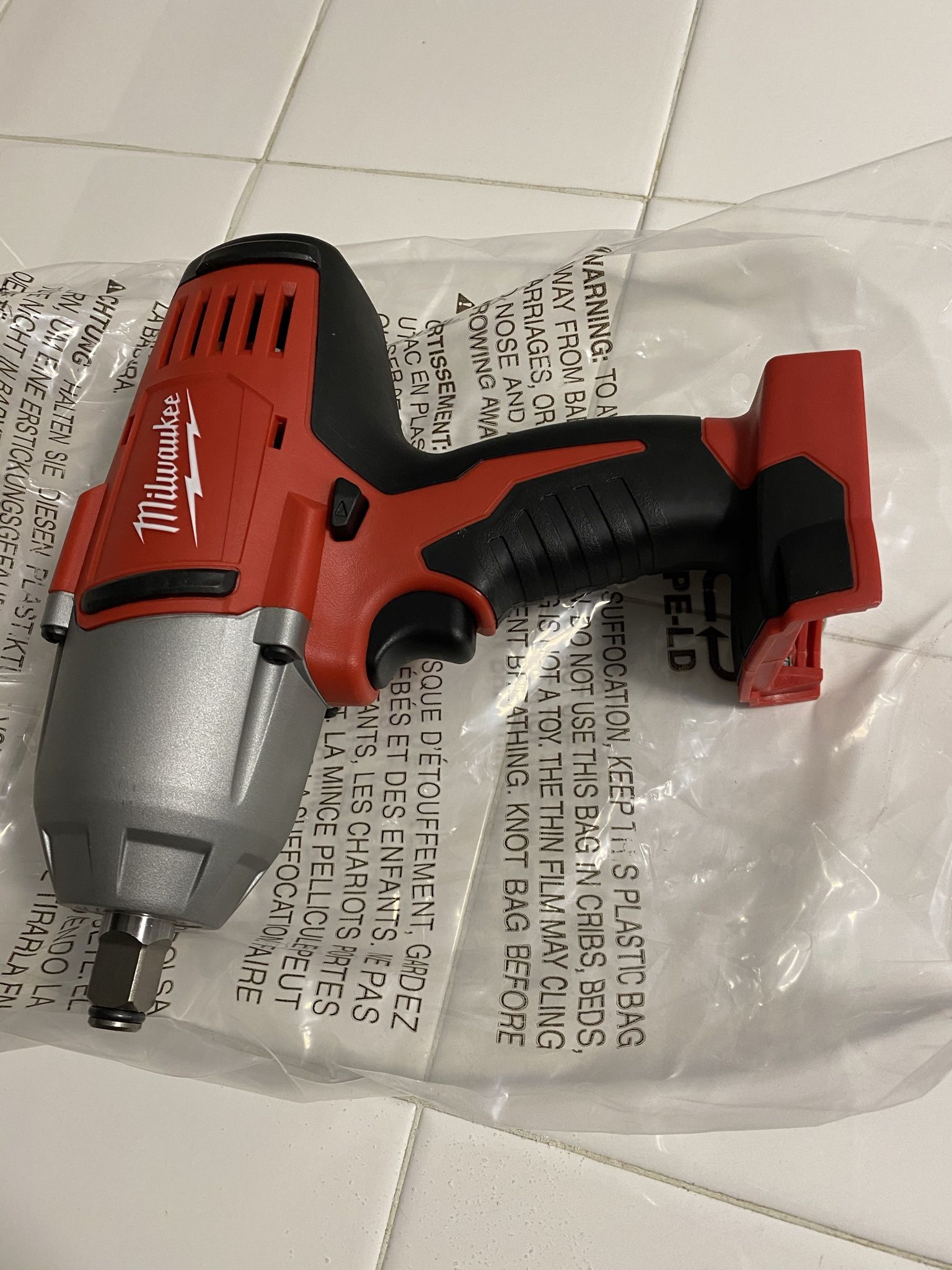 Milwaukee impact wrench (tools only) brand new 450 torque. (Tools Only )