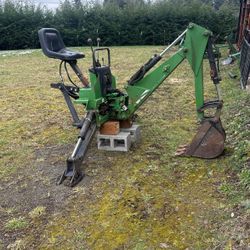 Backhoe attachment