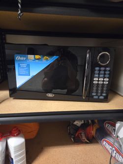 Oster Countertop Microwave Oven - Black (Excellent Condition)