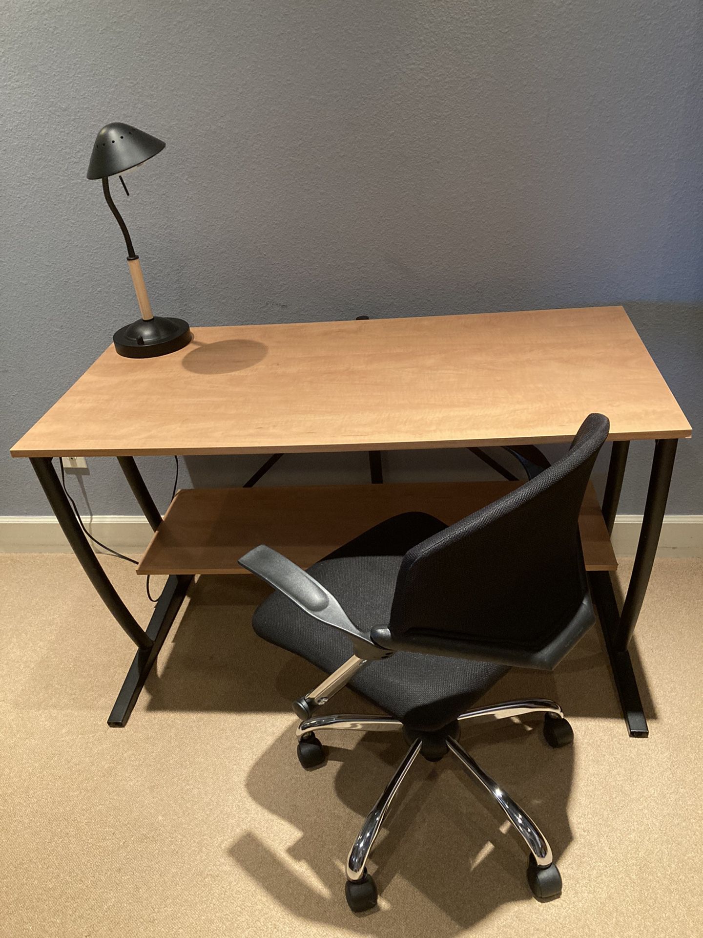 Desk, Pneumatic Chair and Lamp.