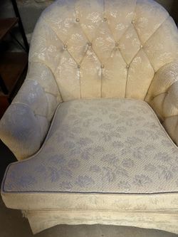 Pair of vintage cream tufted armchairs