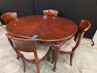 Traditional Dark Wood Oval Dining Table with Four Upholstered Chairs