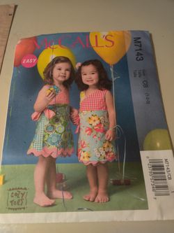 McCall's toddler's dress pattern m7143 Uncut