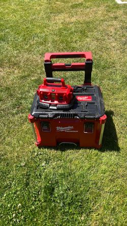 Milwaukee packout box and 6 pack charger.  Used. Really good working condition