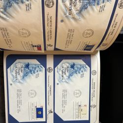 ALBUM OF FIRST DAY ISSUE STAMPS