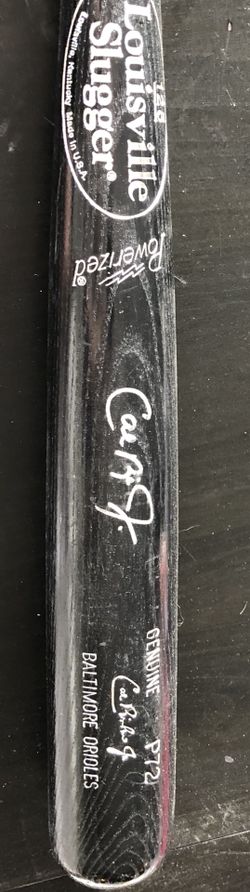 Baseball bat autographed by Cal Ripken