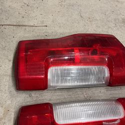 F250 Tail Lights One Has Some Damage 