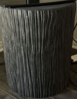 Black End Or side Table Hollow $60 (Diameter Approx 16.5 in height 19.75 In) $60