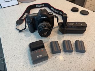 Canon 5D, Canon f1.4 lens, vertical grip and 3 Canon batteries