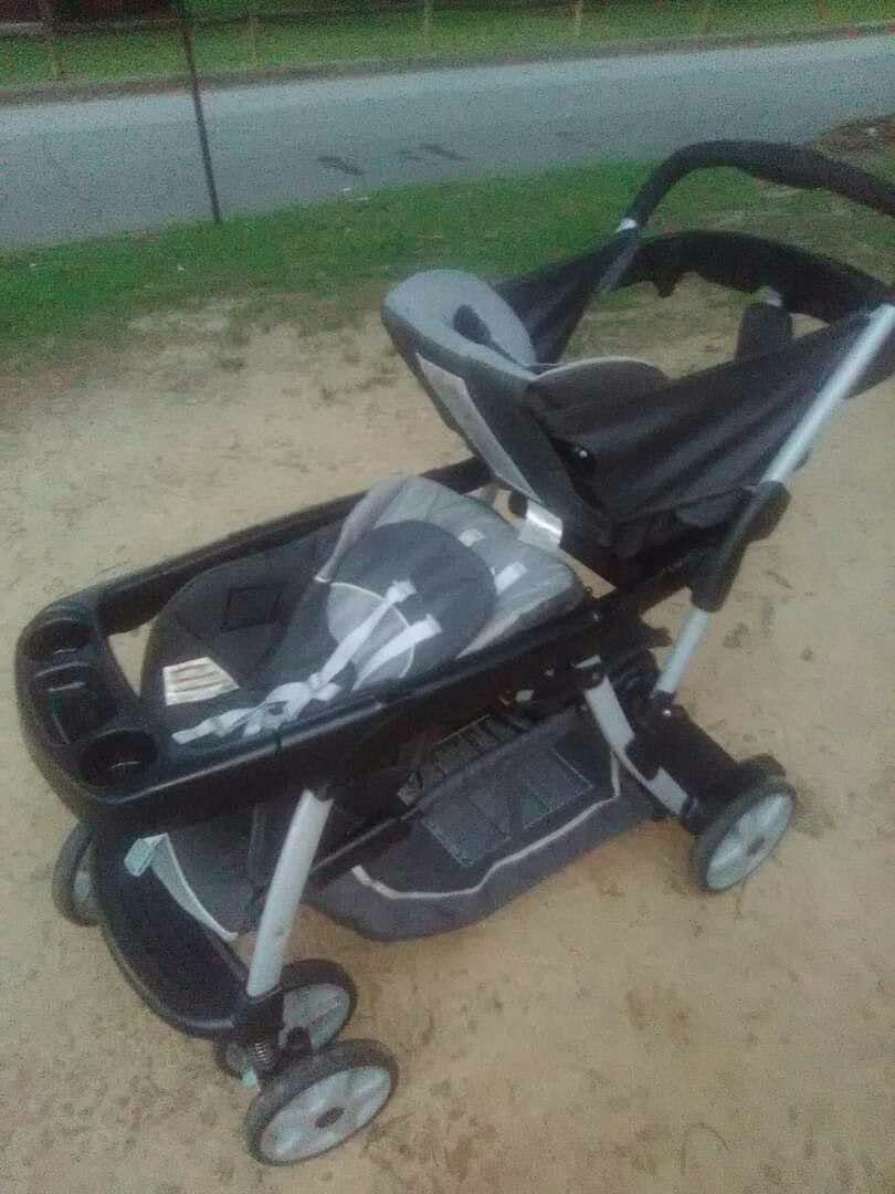 Double stroller with infant car seat and base