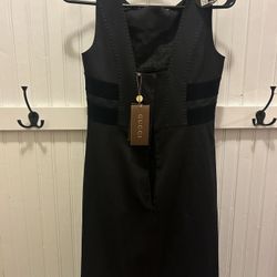 Vintage Gucci, sleeveless black dress with suede stripes