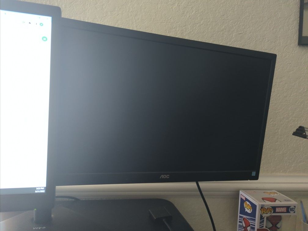 Selling Two Monitors AOC Flexible Dual monitor 360 Stand Included