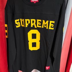 Supreme Affiliated Long-Sleeve Football Top in black with gold and the number 8