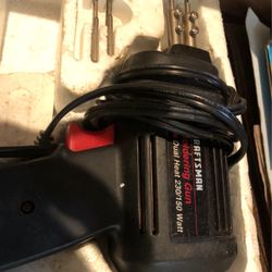 Box Of Sandpaper And Soldering Gun