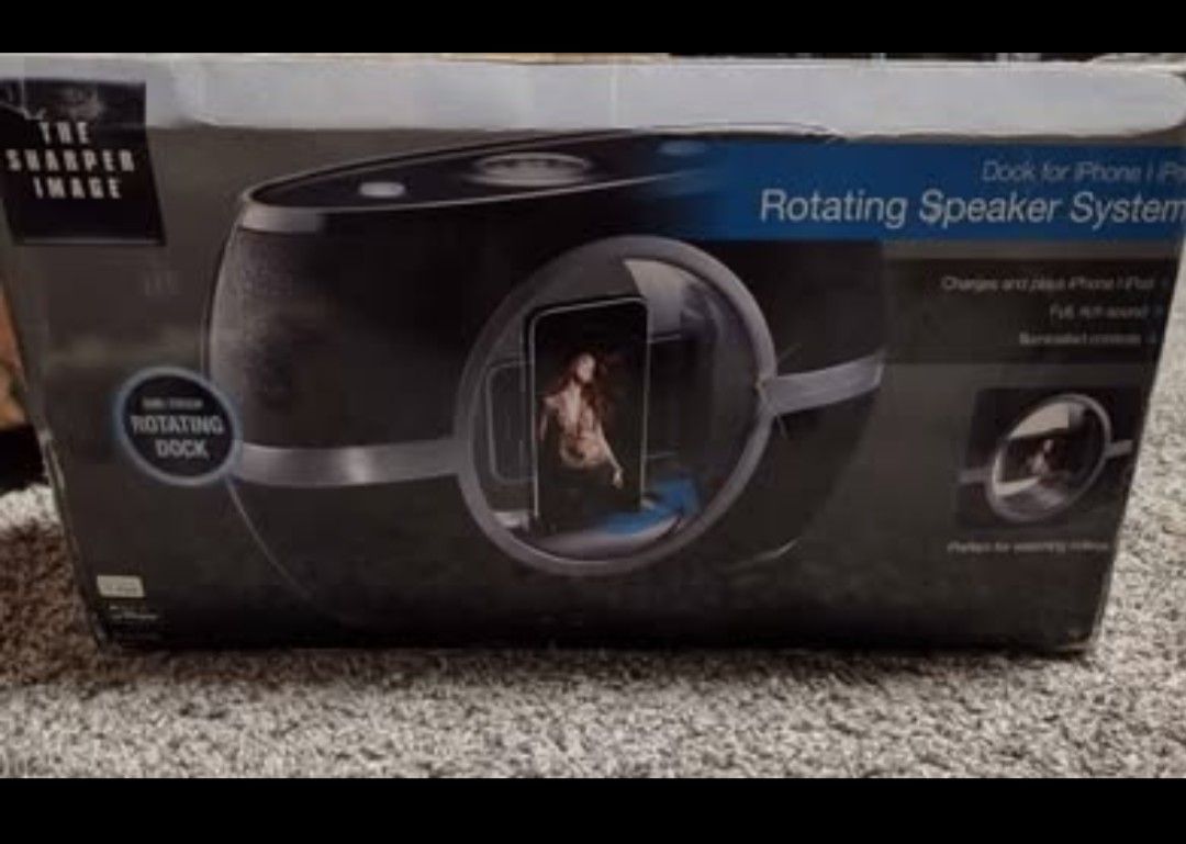 Sharper Imagine Rotating Speaker System Dock for iPhone/iPod.