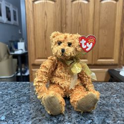 Ty Beanie Babie “100th Anniversary Teddy Bear 2002” Bear”.  Brand New with Tags.  New Size 7 inches Tall . Brand New With Tags 