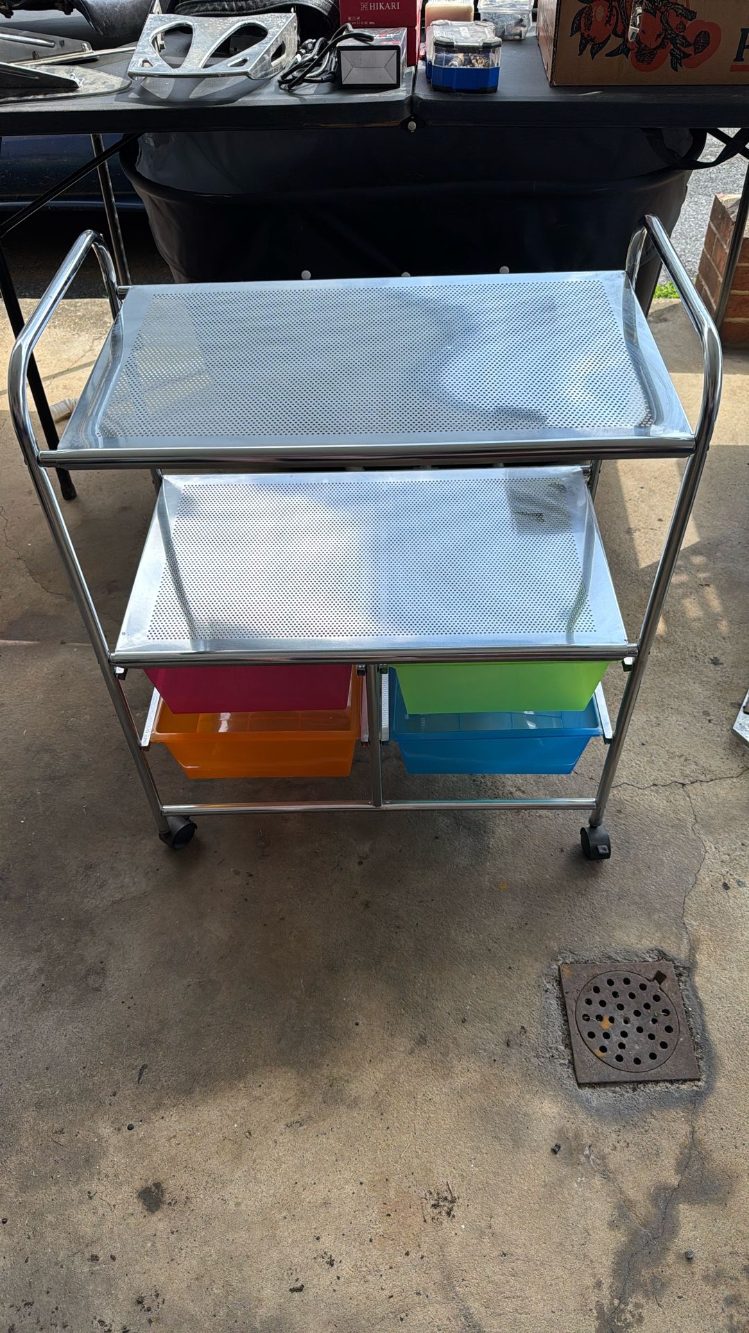 Metal rolling rack with four pull out containers