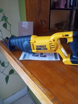 DeWalt.  20 v  max.   New sawzal