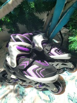 Nattork purple and white rollerblades youth large