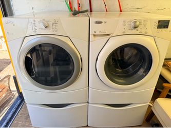 Electric front loading Whirlpool duet Washer Dryer with pedestal Storage