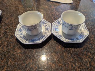 Teacups with saucers