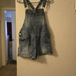 blue denim overalls with adjustable straps