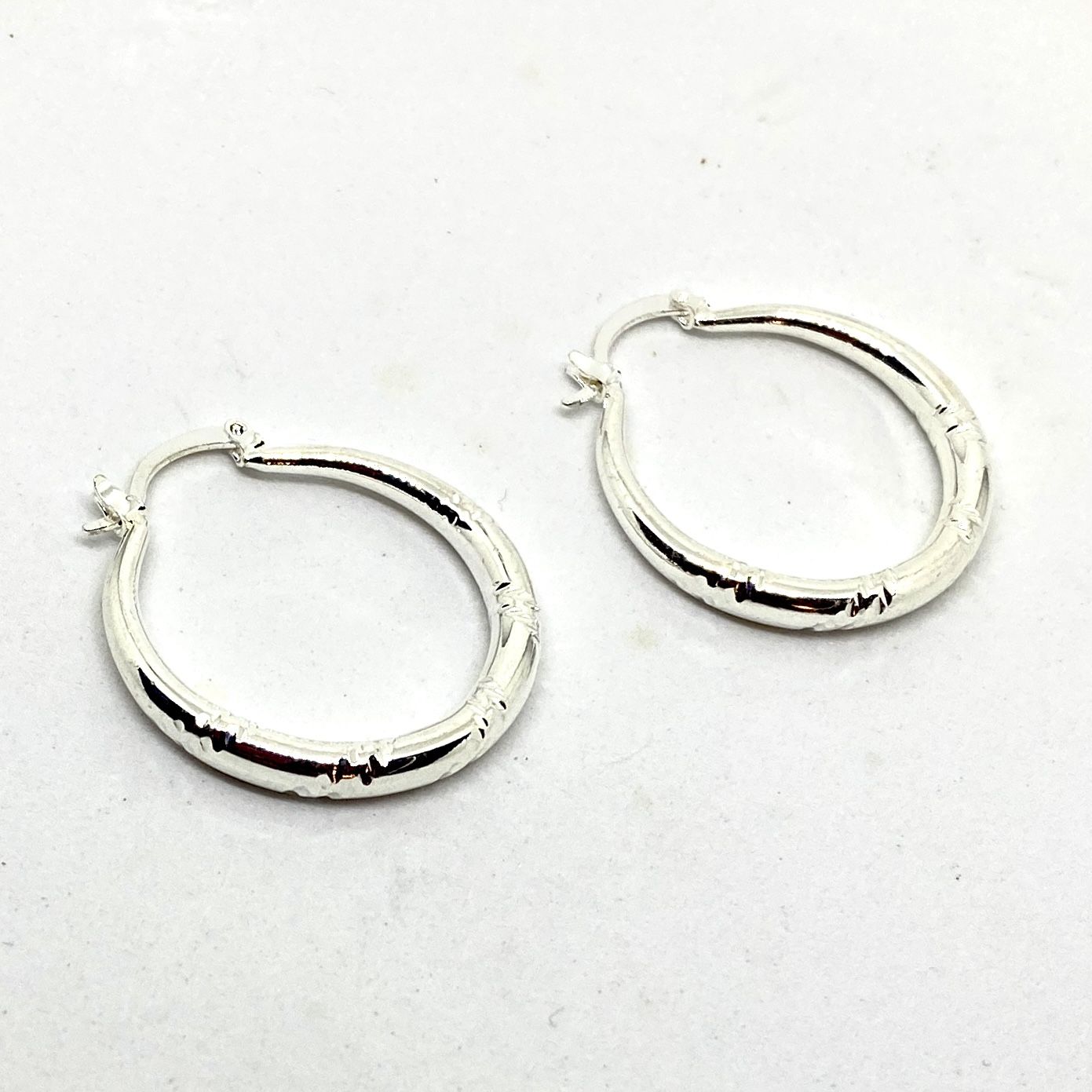 Sterling High Polished 3mm Cut Design Tube Hoop Earrings by Gold & Honey