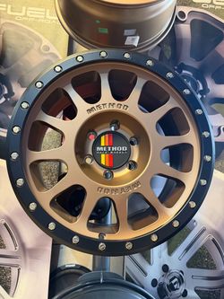 4-New Method MR305 17x8.5 6x139.7 Bronze wheels with flush center caps (We Finance)