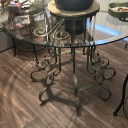 Round glass table  sage rod iron base  48”  great condition 350&  pl up Everett  Mall Way