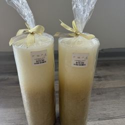 Oversized Gold and White Candles $15