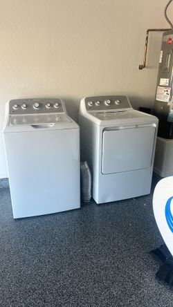 GE 27-inch top-load washing machine and front load dryer