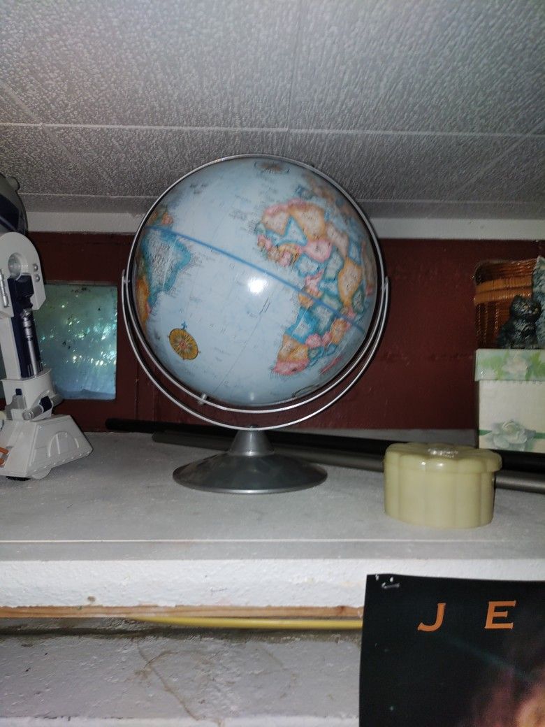 World Globe Roughly 13" Great Condition on Rotating Stand